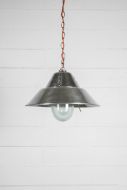 Polished industrial light with shade